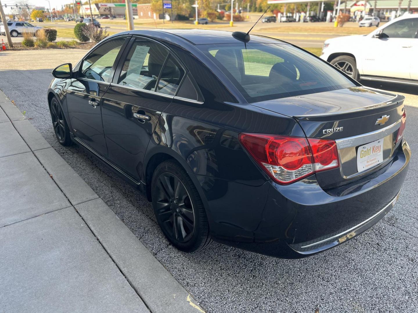 2015 Black Granite Metallic Chevrolet Cruze LTZ Auto (1G1PG5SB5F7) with an 1.4L L4 DOHC 16V TURBO engine, 6-Speed Automatic transmission, located at 1633 W Kimberly, Davenport, IA, 52806, (563) 323-5341, 41.559456, -90.598732 - Photo#3