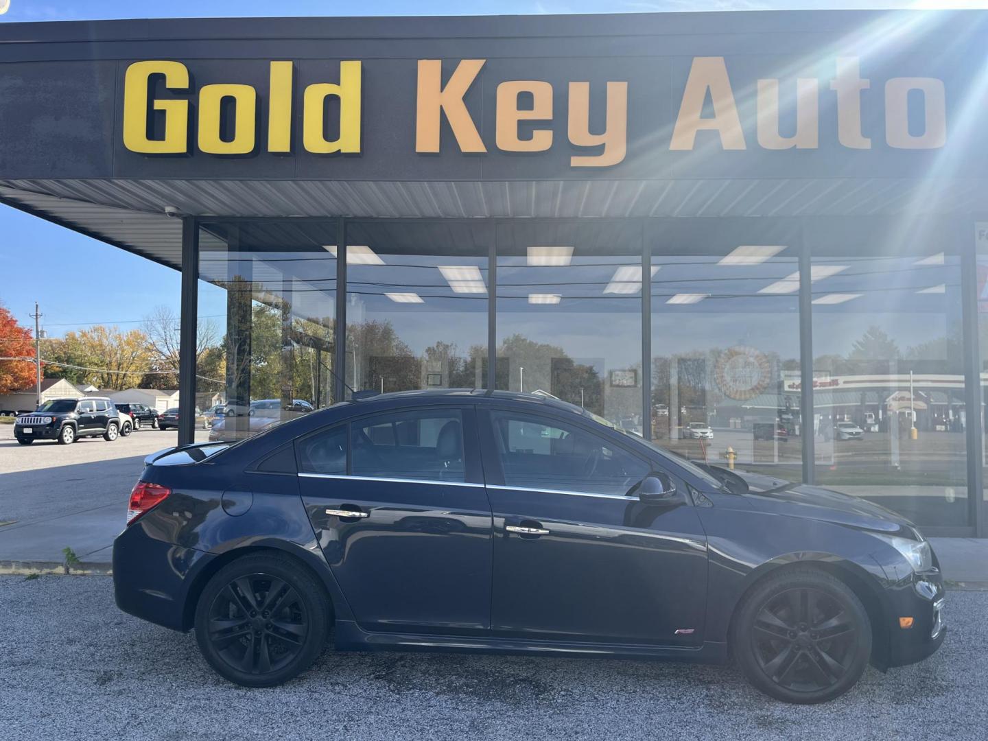 2015 Black Granite Metallic Chevrolet Cruze LTZ Auto (1G1PG5SB5F7) with an 1.4L L4 DOHC 16V TURBO engine, 6-Speed Automatic transmission, located at 1633 W Kimberly, Davenport, IA, 52806, (563) 323-5341, 41.559456, -90.598732 - Photo#0