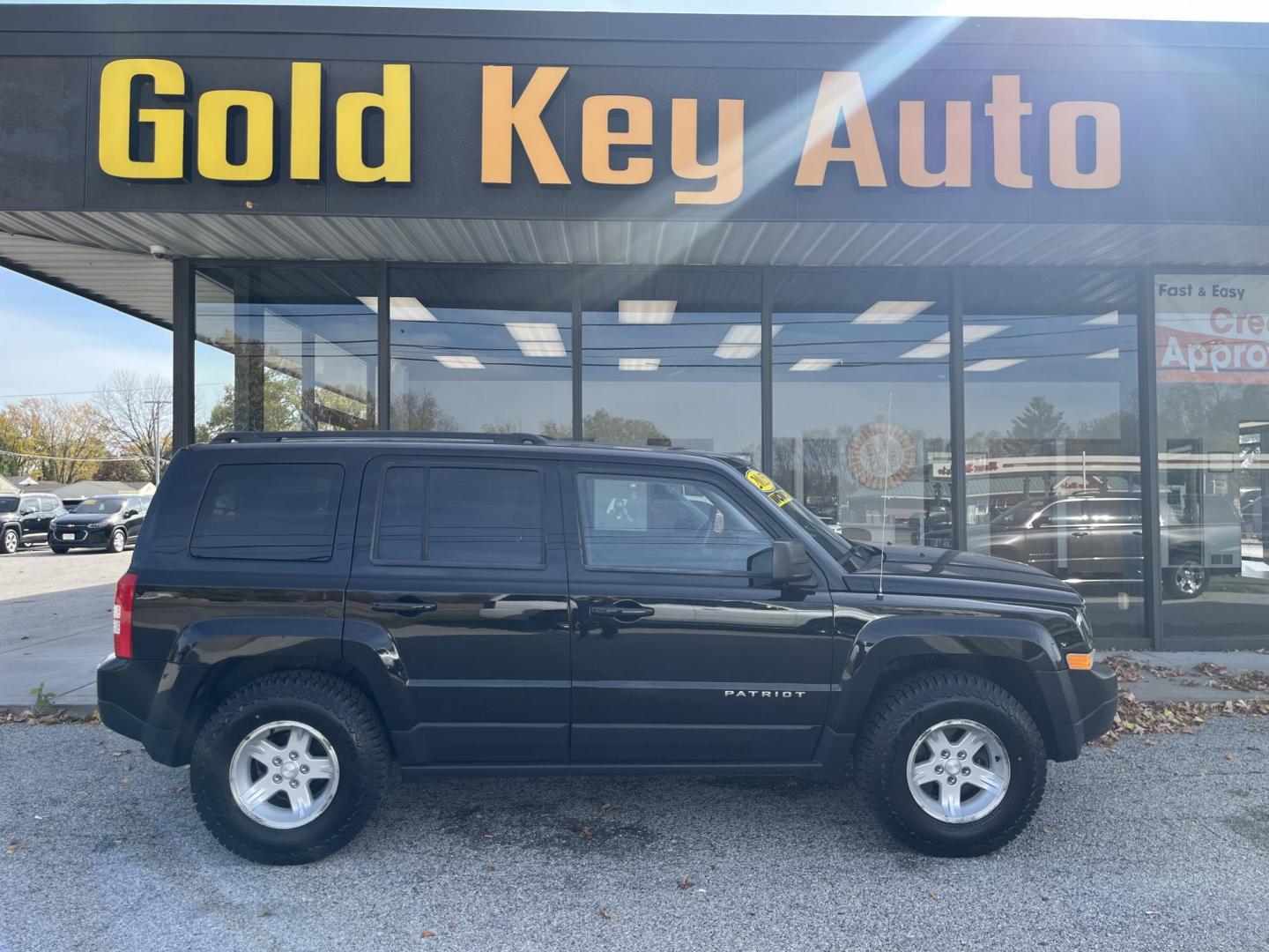 2015 Black Clearcoat Jeep Patriot Sport 4WD (1C4NJRBB5FD) with an 2.4L L4 DOHC 16V engine, located at 1633 W Kimberly, Davenport, IA, 52806, (563) 323-5341, 41.559456, -90.598732 - Photo#0