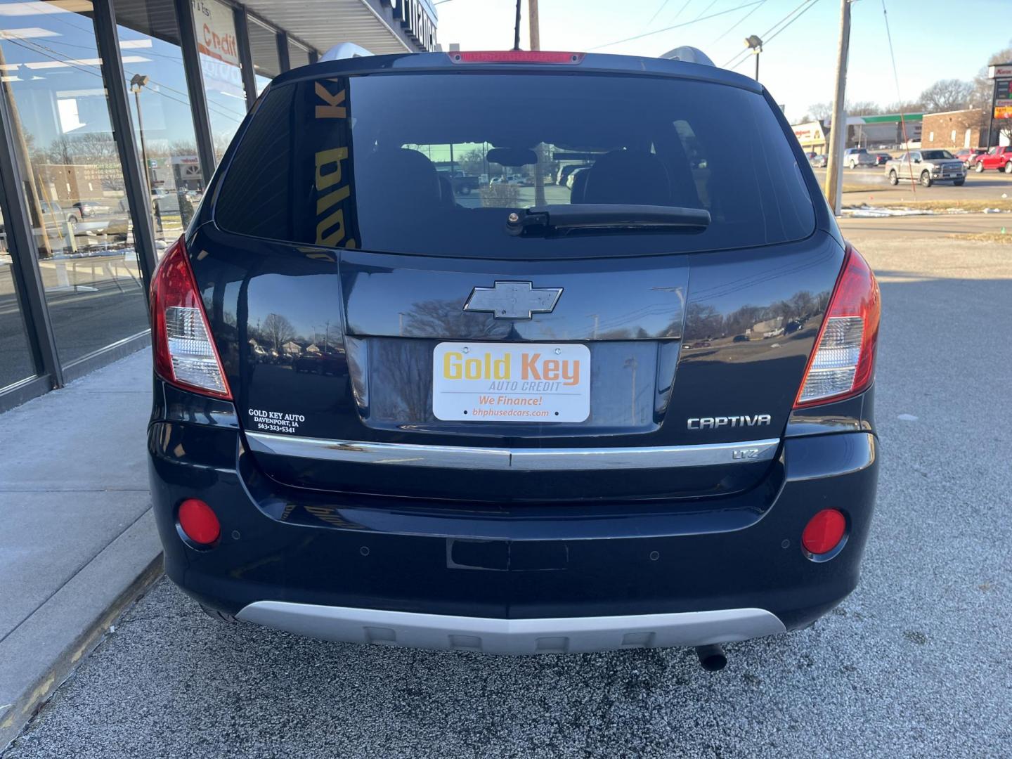 2014 Black Chevrolet Captiva Sport LTZ FWD (3GNAL4EK0ES) with an 2.4L L4 DOHC 16V FFV engine, 6-Speed Automatic transmission, located at 1633 W Kimberly, Davenport, IA, 52806, (563) 323-5341, 41.559456, -90.598732 - Photo#4