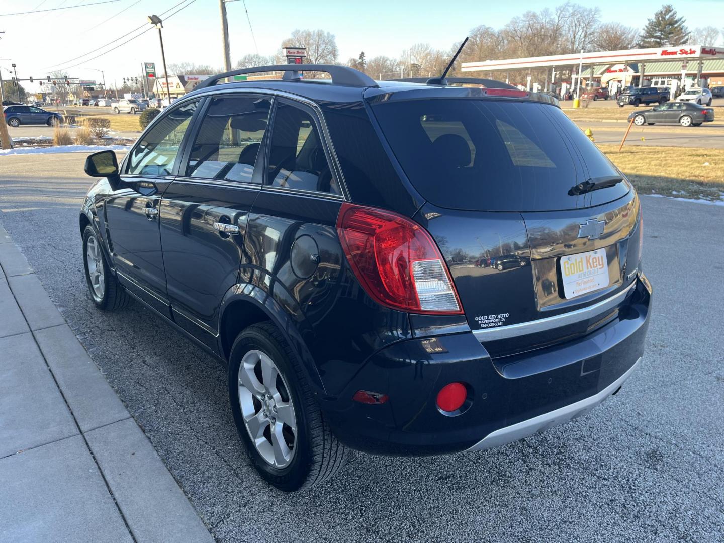 2014 Black Chevrolet Captiva Sport LTZ FWD (3GNAL4EK0ES) with an 2.4L L4 DOHC 16V FFV engine, 6-Speed Automatic transmission, located at 1633 W Kimberly, Davenport, IA, 52806, (563) 323-5341, 41.559456, -90.598732 - Photo#3