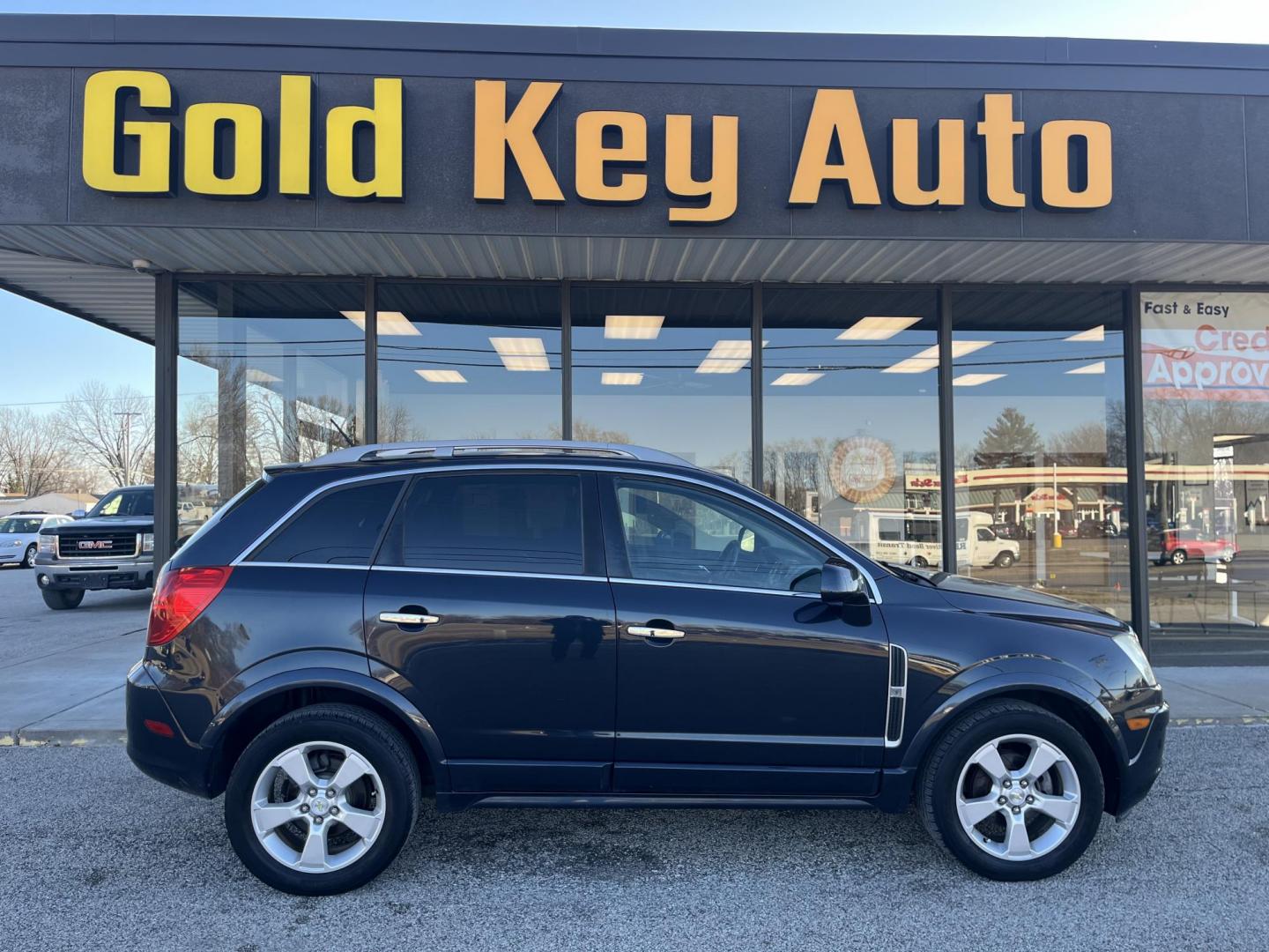 2014 Black Chevrolet Captiva Sport LTZ FWD (3GNAL4EK0ES) with an 2.4L L4 DOHC 16V FFV engine, 6-Speed Automatic transmission, located at 1633 W Kimberly, Davenport, IA, 52806, (563) 323-5341, 41.559456, -90.598732 - Photo#0