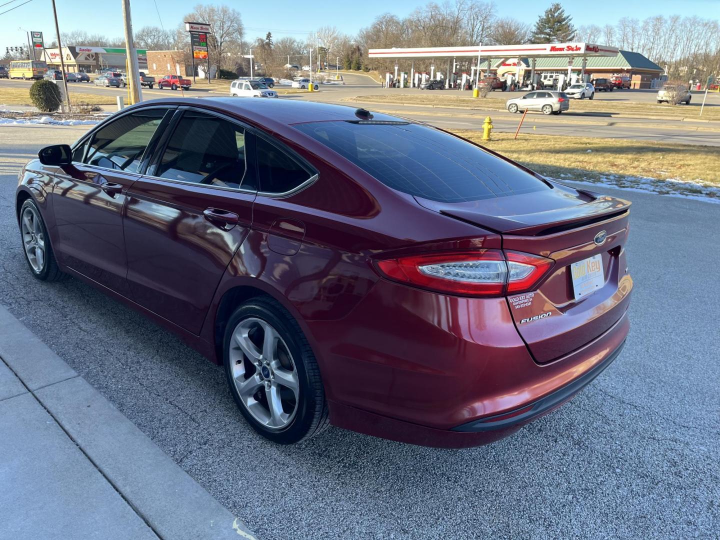 2013 Ruby Red Met Tinted CC Ford Fusion SE (3FA6P0H73DR) with an 2.5L L4 DOHC 16V engine, located at 1633 W Kimberly, Davenport, IA, 52806, (563) 323-5341, 41.559456, -90.598732 - Photo#3