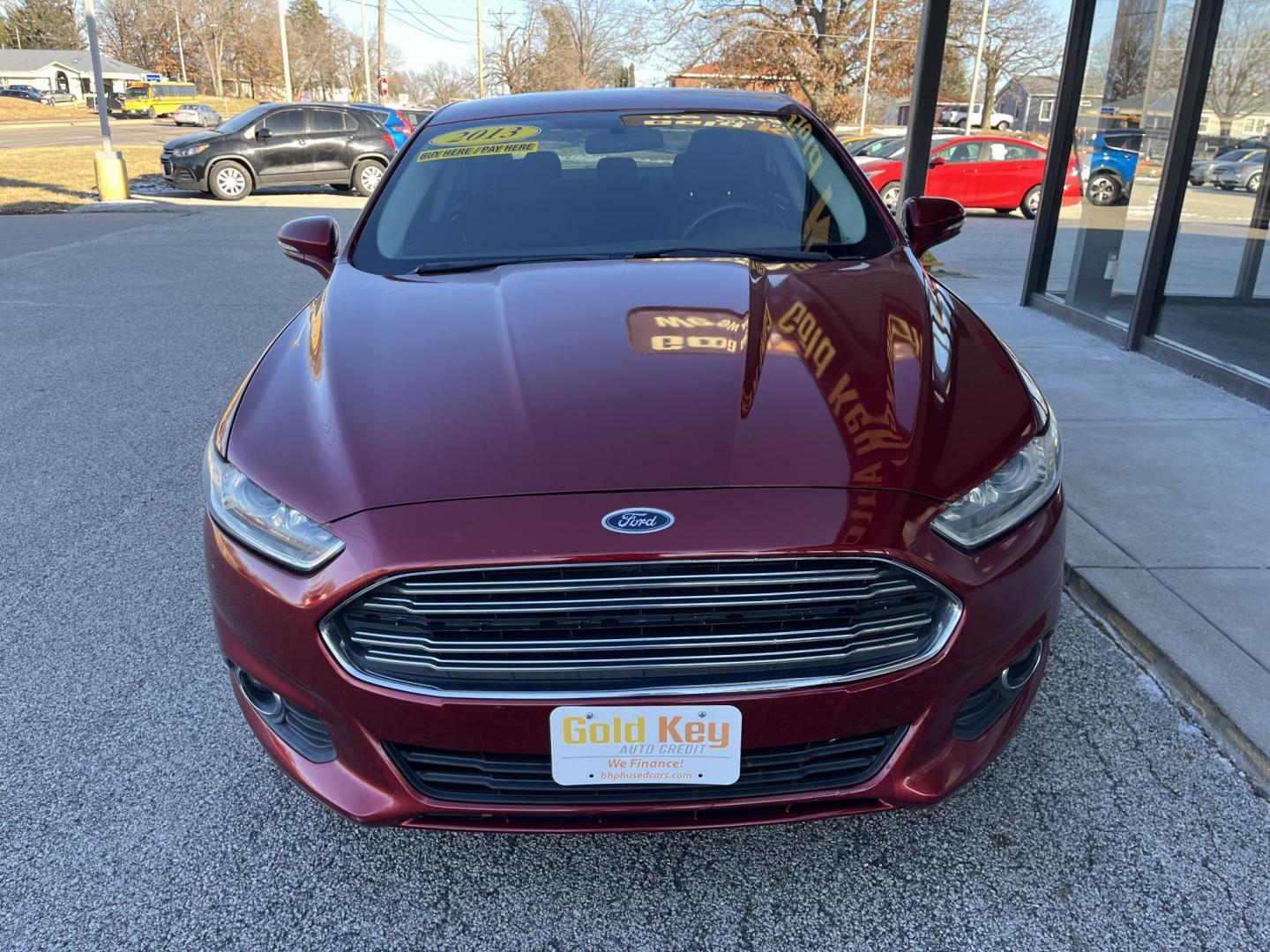 2013 Ruby Red Met Tinted CC Ford Fusion SE (3FA6P0H73DR) with an 2.5L L4 DOHC 16V engine, located at 1633 W Kimberly, Davenport, IA, 52806, (563) 323-5341, 41.559456, -90.598732 - Photo#1