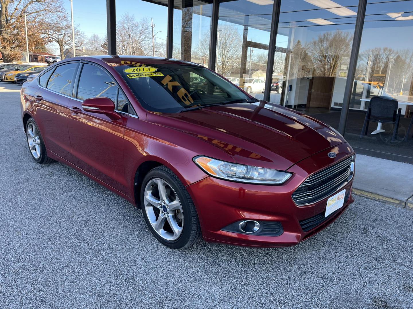 2013 Ruby Red Met Tinted CC Ford Fusion SE (3FA6P0H73DR) with an 2.5L L4 DOHC 16V engine, located at 1633 W Kimberly, Davenport, IA, 52806, (563) 323-5341, 41.559456, -90.598732 - Photo#2