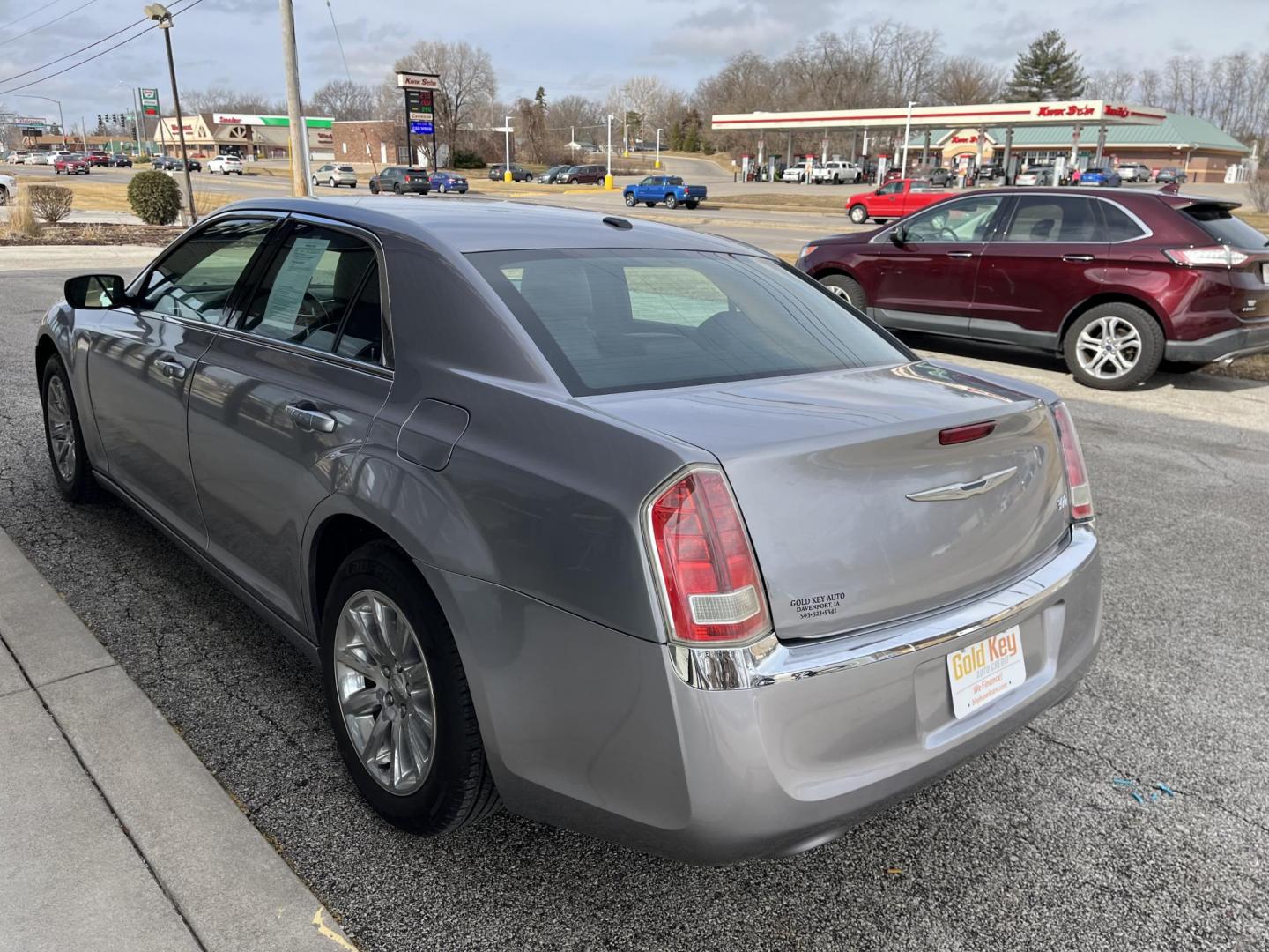 2014 Chrysler 300 RWD (2C3CCAAG2EH) with an 3.6L V6 SOHC 24V engine, 8-Speed Automatic transmission, located at 1633 W Kimberly, Davenport, IA, 52806, (563) 323-5341, 41.559456, -90.598732 - Photo#3