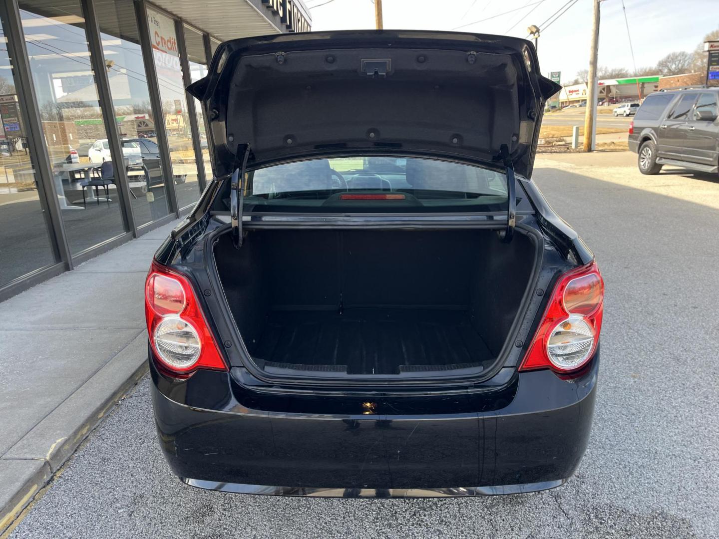 2016 Black Chevrolet Sonic LT (1G1JC5SH2G4) , Auto transmission, located at 1633 W Kimberly, Davenport, IA, 52806, (563) 323-5341, 41.559456, -90.598732 - Photo#5