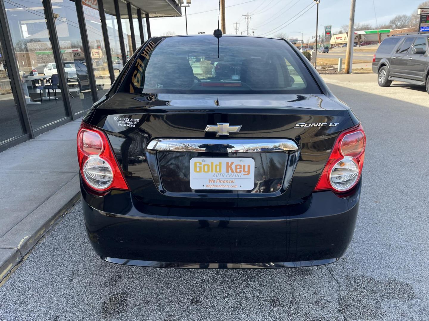 2016 Black Chevrolet Sonic LT (1G1JC5SH2G4) , Auto transmission, located at 1633 W Kimberly, Davenport, IA, 52806, (563) 323-5341, 41.559456, -90.598732 - Photo#4