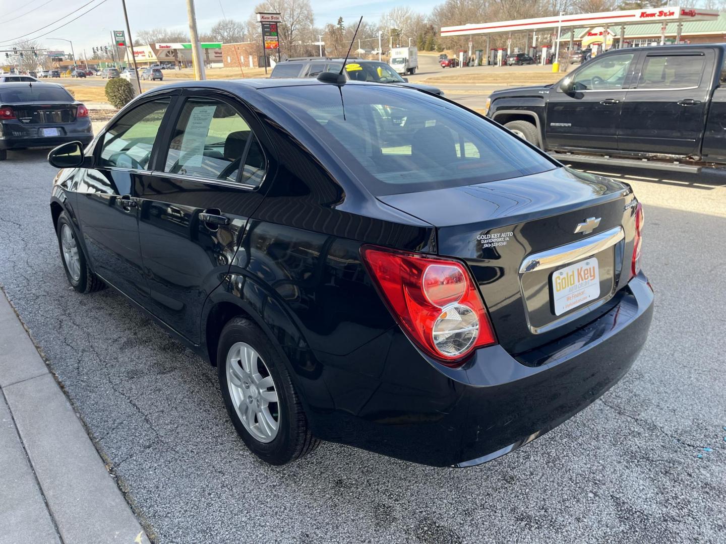 2016 Black Chevrolet Sonic LT (1G1JC5SH2G4) , Auto transmission, located at 1633 W Kimberly, Davenport, IA, 52806, (563) 323-5341, 41.559456, -90.598732 - Photo#3