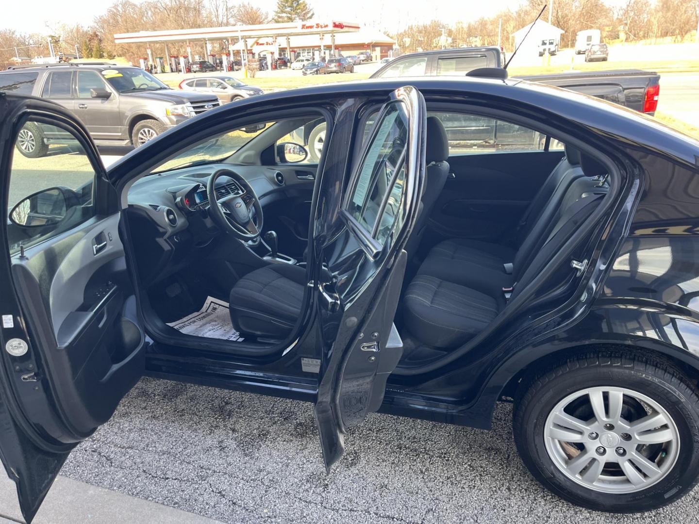 2016 Black Chevrolet Sonic LT (1G1JC5SH2G4) , Auto transmission, located at 1633 W Kimberly, Davenport, IA, 52806, (563) 323-5341, 41.559456, -90.598732 - Photo#8