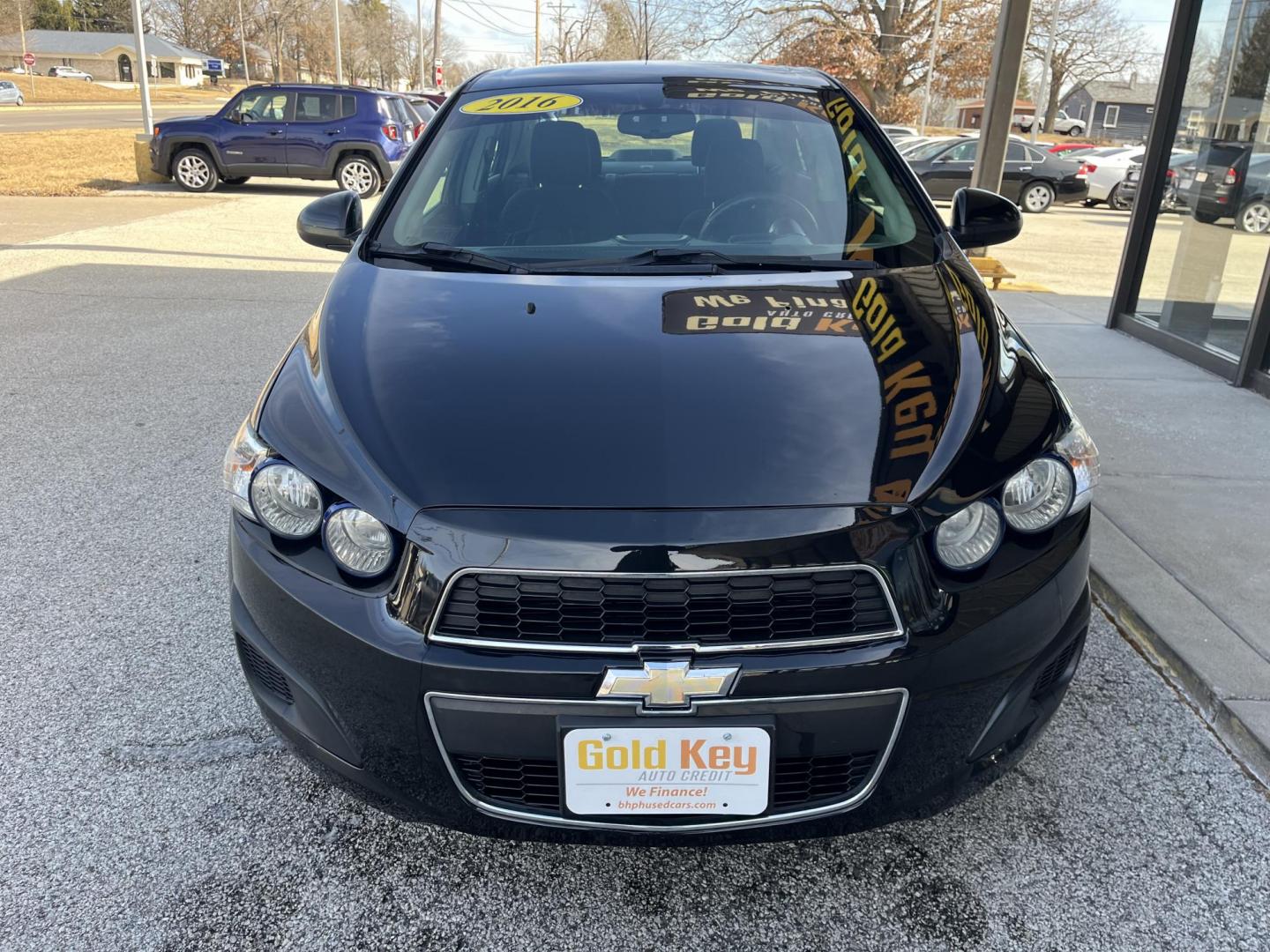 2016 Black Chevrolet Sonic LT (1G1JC5SH2G4) , Auto transmission, located at 1633 W Kimberly, Davenport, IA, 52806, (563) 323-5341, 41.559456, -90.598732 - Photo#1