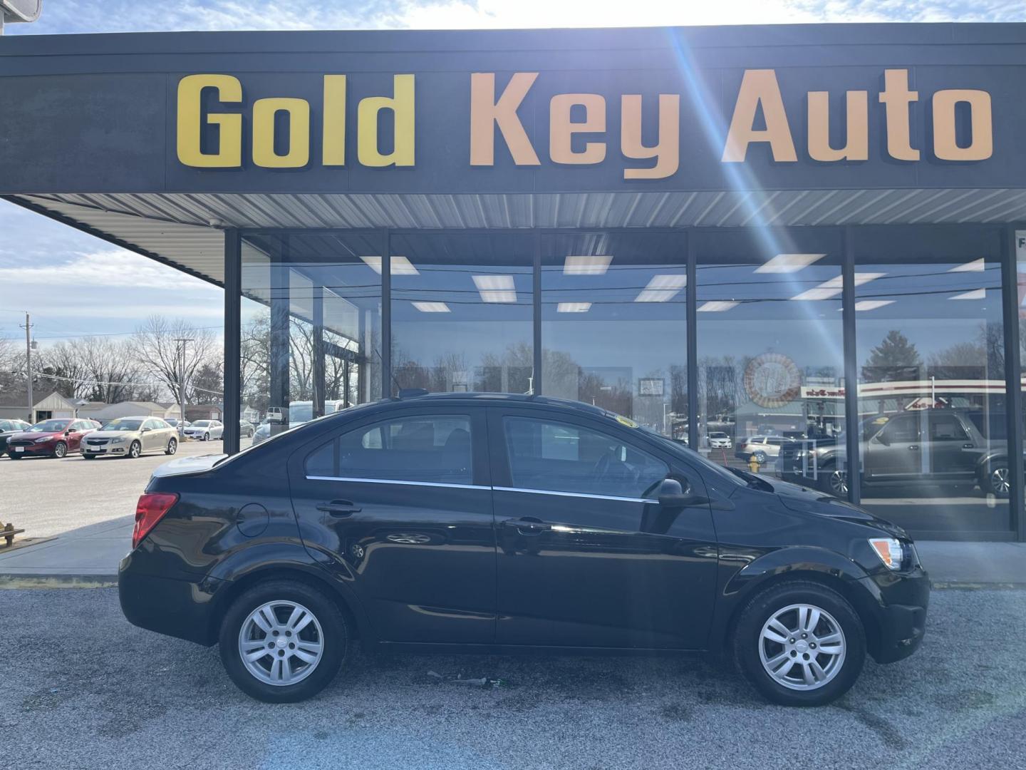 2016 Black Chevrolet Sonic LT (1G1JC5SH2G4) , Auto transmission, located at 1633 W Kimberly, Davenport, IA, 52806, (563) 323-5341, 41.559456, -90.598732 - Photo#0