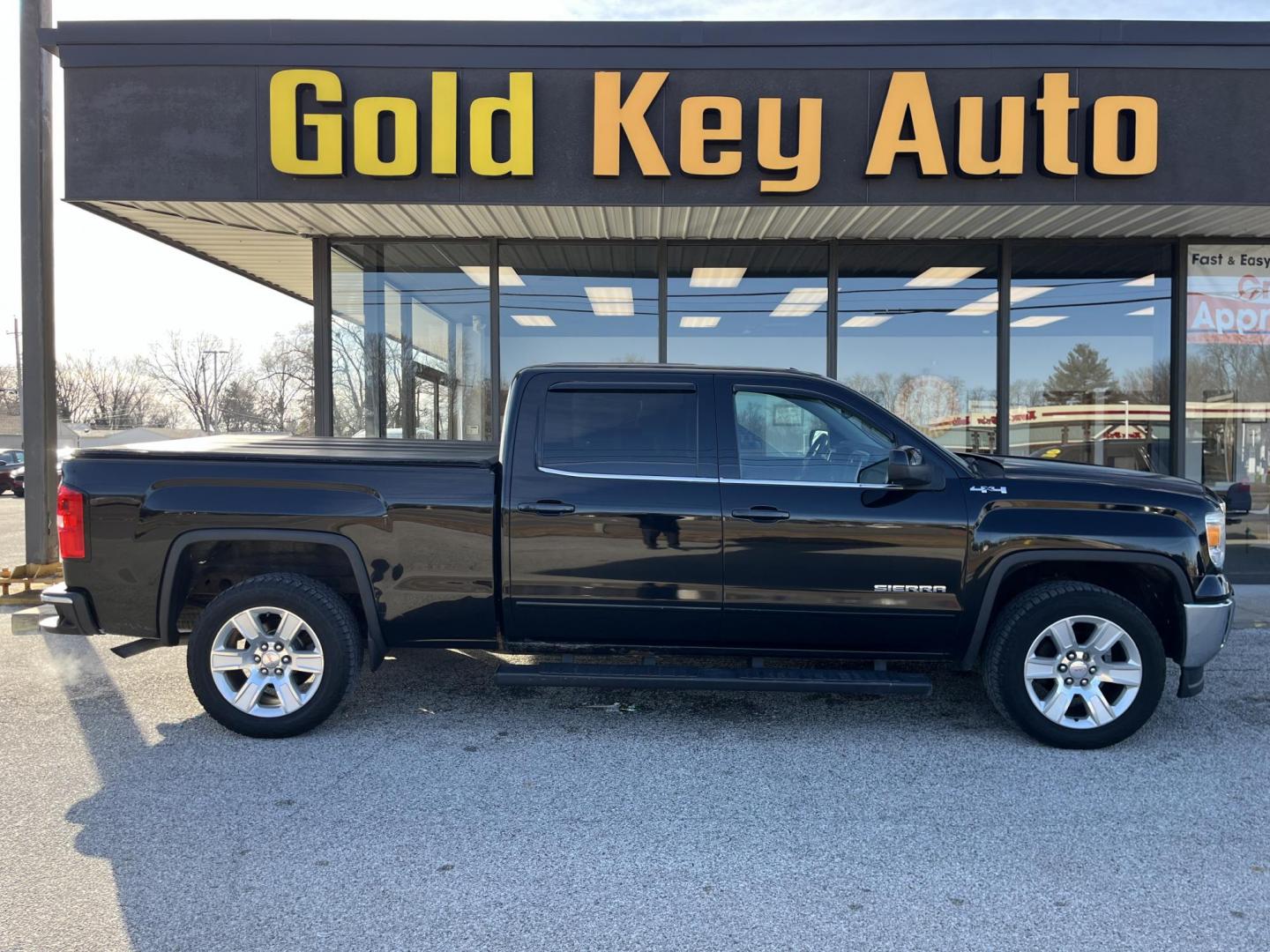 2014 Onyx Black GMC Sierra 1500 SLE (3GTU2UEC0EG) with an EcoTec3 4.3L V-6 gasoline direct injection engine, located at 1633 W Kimberly, Davenport, IA, 52806, (563) 323-5341, 41.559456, -90.598732 - Photo#0