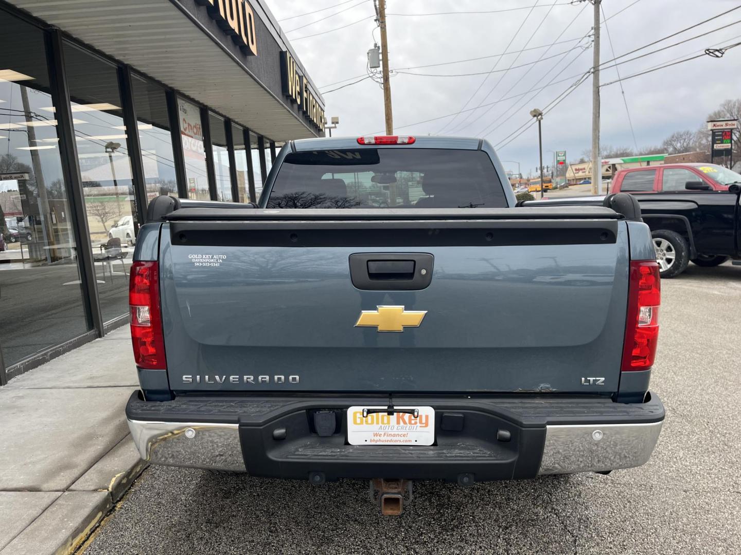 2013 Blue Granite Metallic Chevrolet Silverado 1500 LTZ (3GCPKTE77DG) with an Vortec 5.3L V-8 variable valve control engine, located at 1633 W Kimberly, Davenport, IA, 52806, (563) 323-5341, 41.559456, -90.598732 - Photo#2