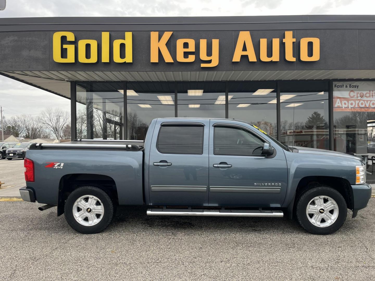 2013 Blue Granite Metallic Chevrolet Silverado 1500 LTZ (3GCPKTE77DG) with an Vortec 5.3L V-8 variable valve control engine, located at 1633 W Kimberly, Davenport, IA, 52806, (563) 323-5341, 41.559456, -90.598732 - Photo#0