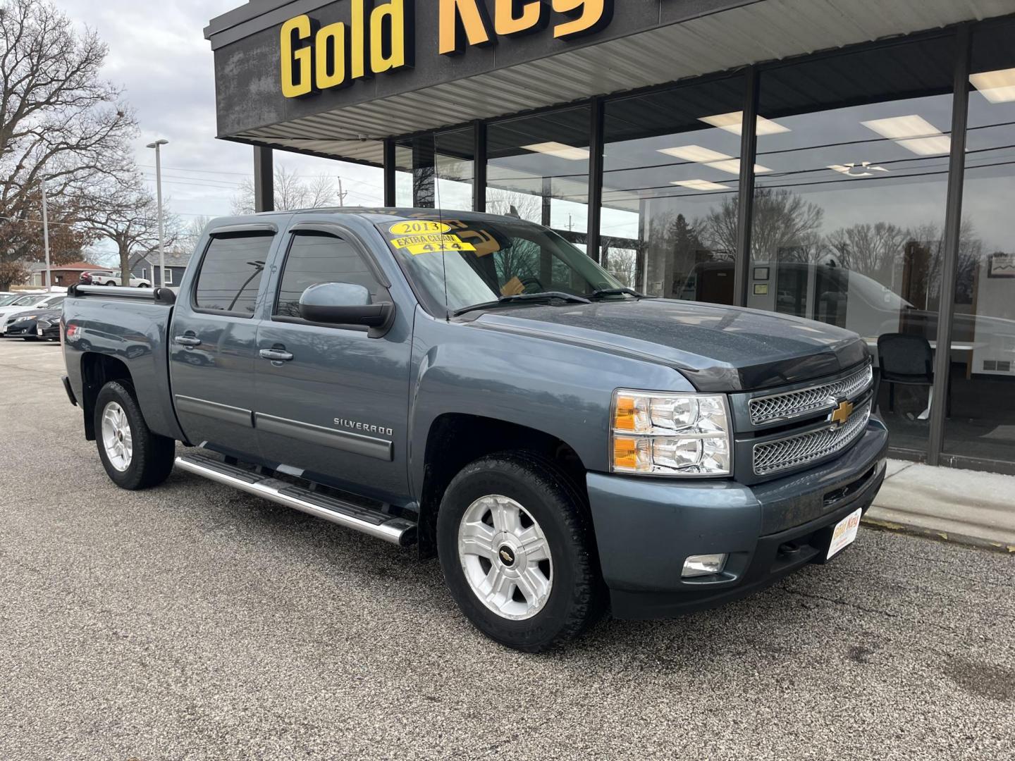 2013 Blue Granite Metallic Chevrolet Silverado 1500 LTZ (3GCPKTE77DG) with an Vortec 5.3L V-8 variable valve control engine, located at 1633 W Kimberly, Davenport, IA, 52806, (563) 323-5341, 41.559456, -90.598732 - Photo#3